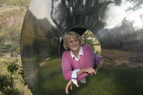 Allison Armour posing inside sculpture